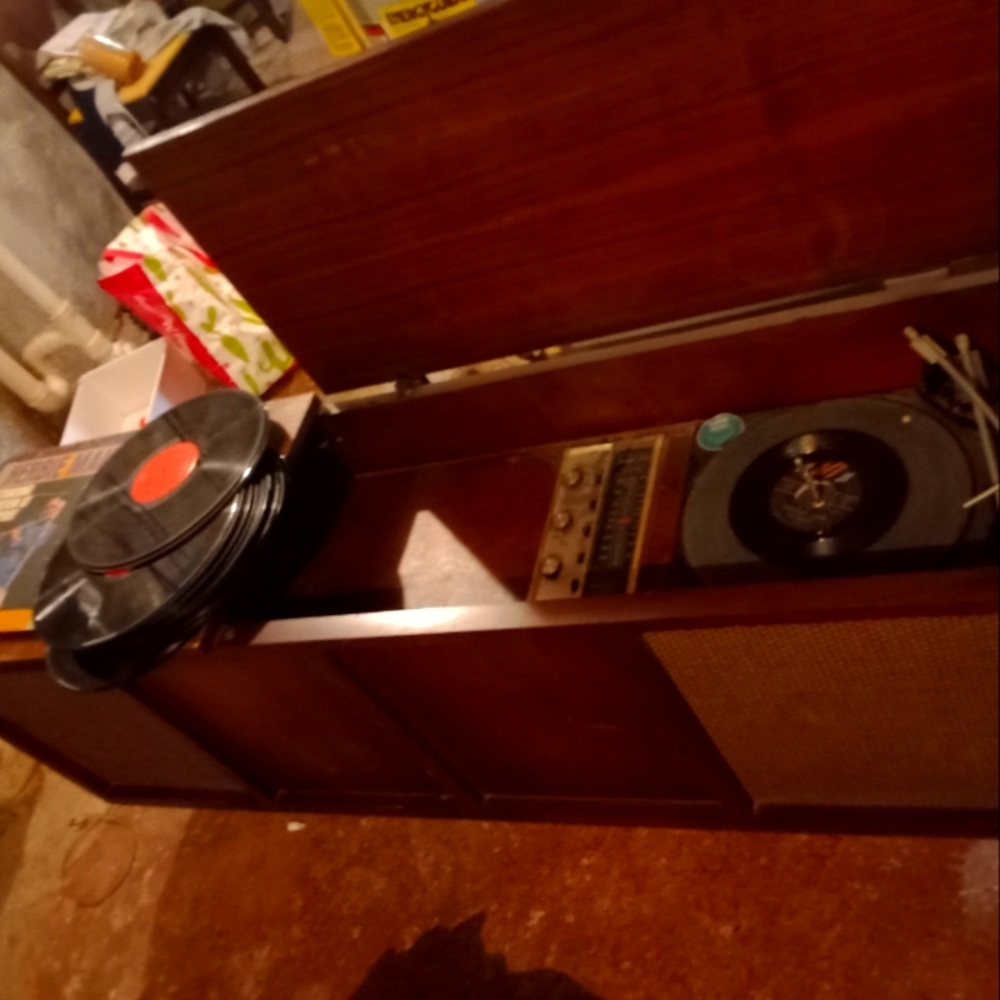 Vintage vinyl record player with working radio